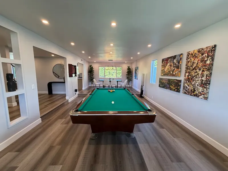 Game room with a Brunswick Gold Crown pool table