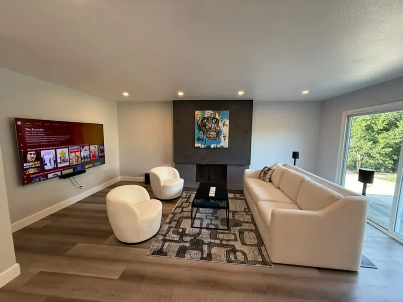 Living room with fireplace and big-screen TV